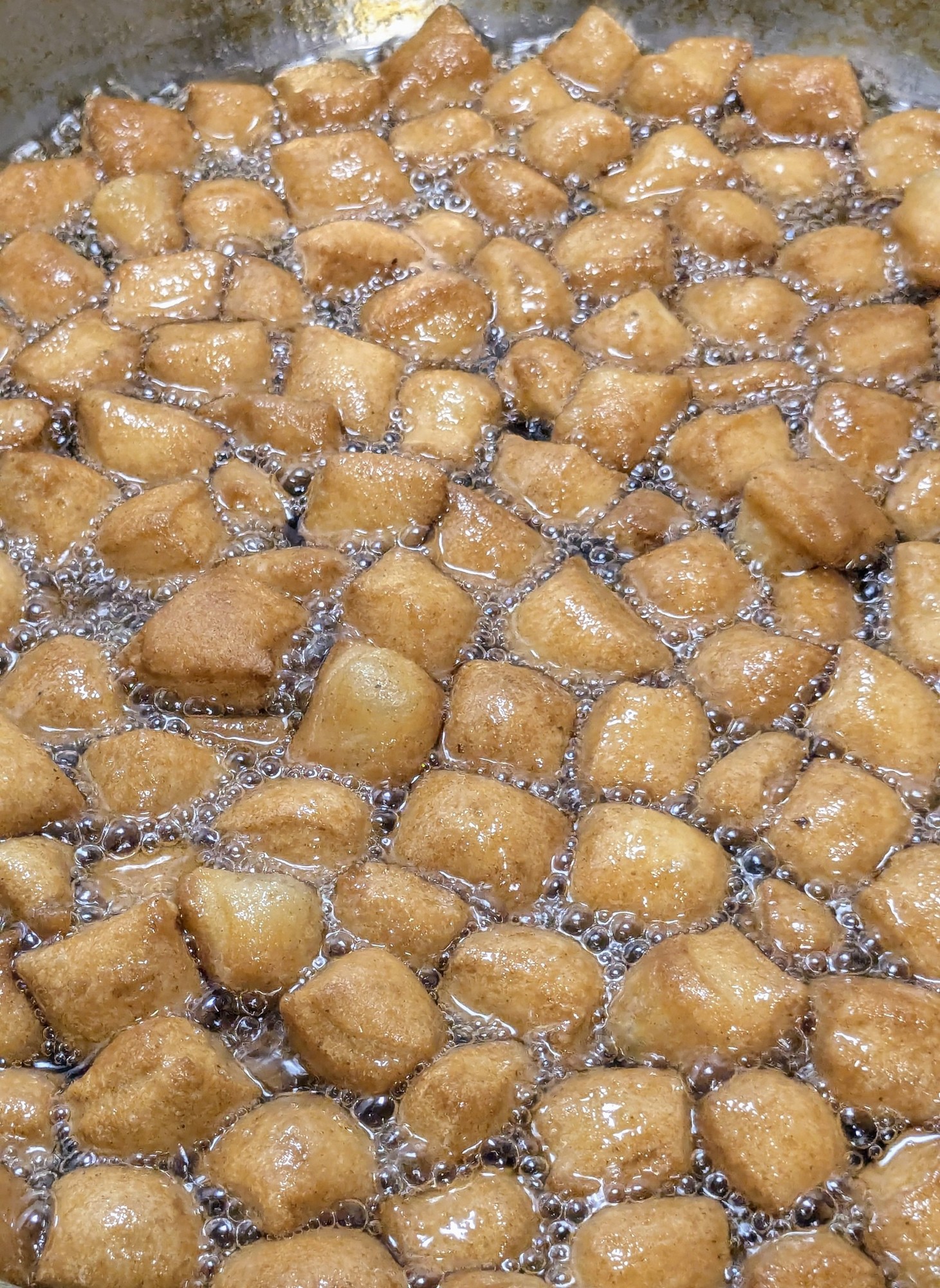 Chin chin frying golden in oil